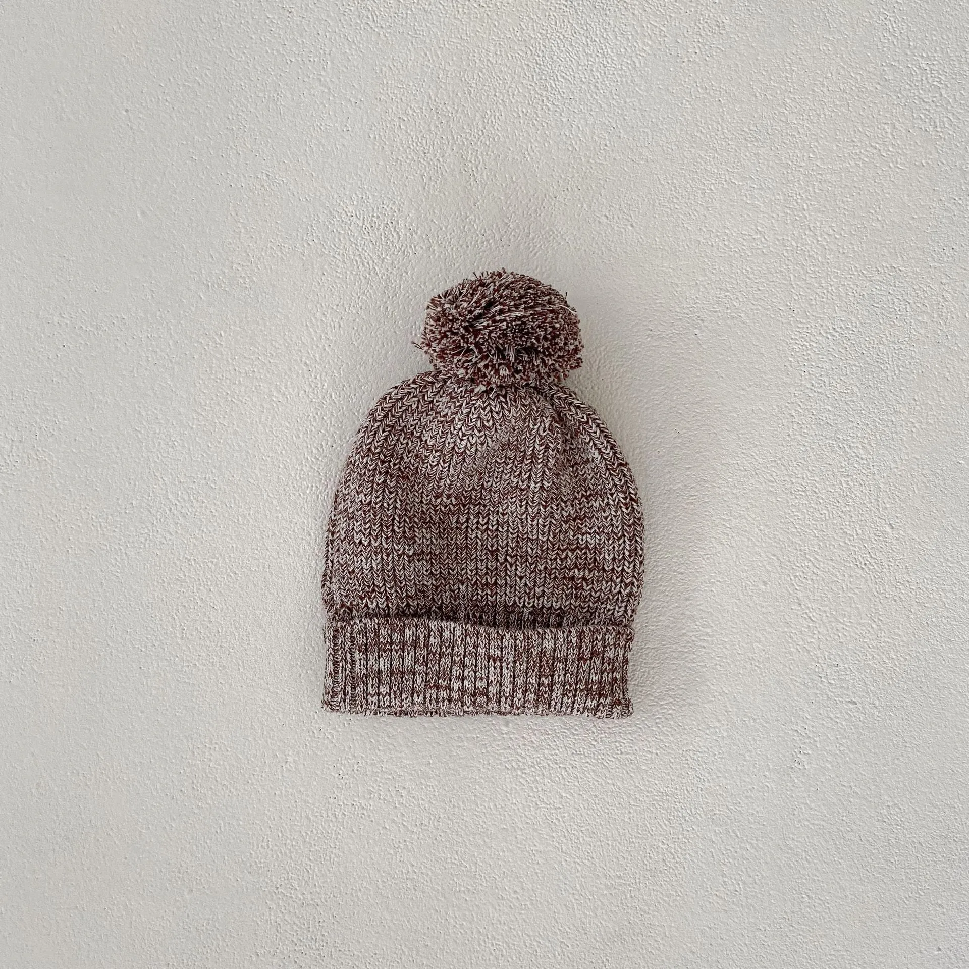 Dark brown cotton knitted three-piece set for infant girl with fur ball hat