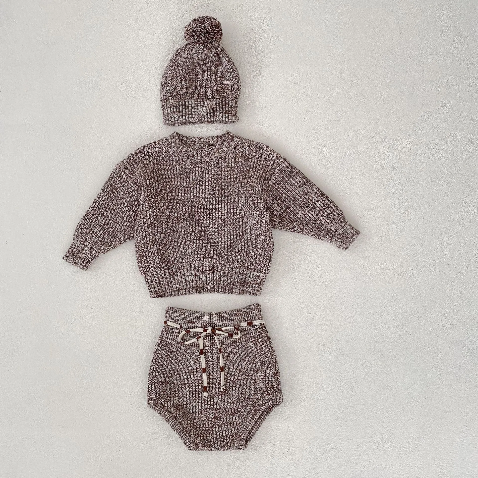 Dark brown cotton knitted three-piece set for infant girl with fur ball hat