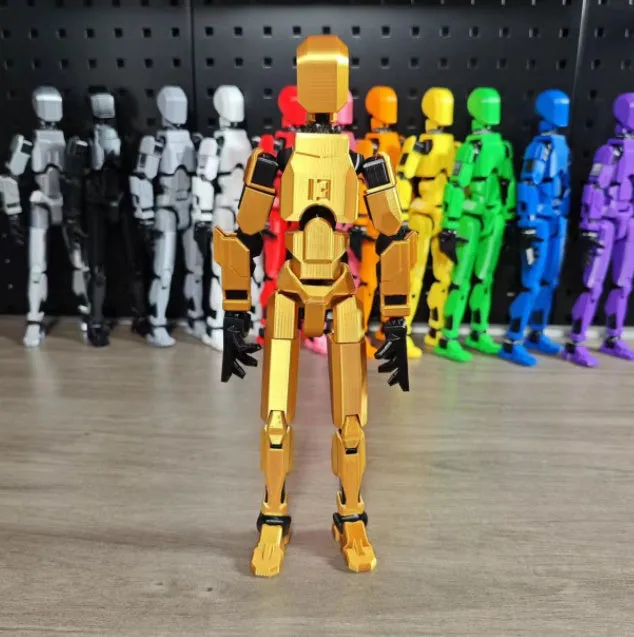 Unassembled 3D printed robot model kit with multi-jointed parts on a table