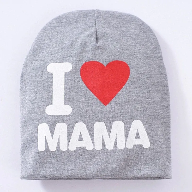 Baby winter hat in grey with 'Love Mama' embroidery, laid flat showing its 20cm height.