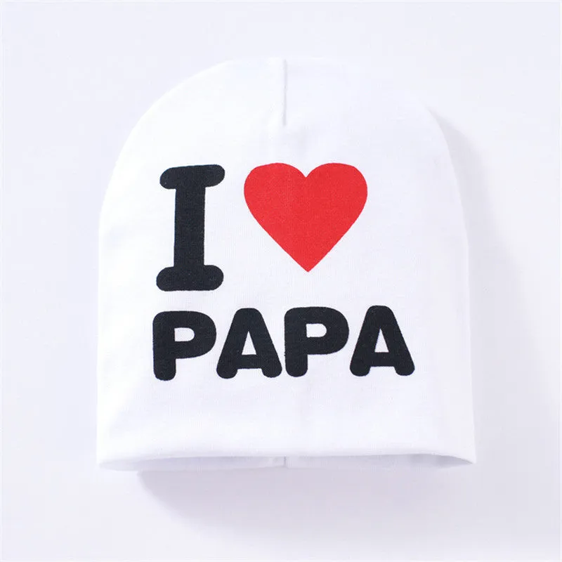 Baby winter hat in grey with 'Love Mama' embroidery, laid flat showing its 20cm height.