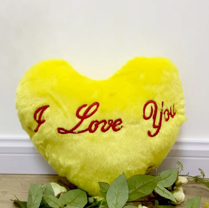 Colourful star-shaped plush cushion with LED flashing lights for children