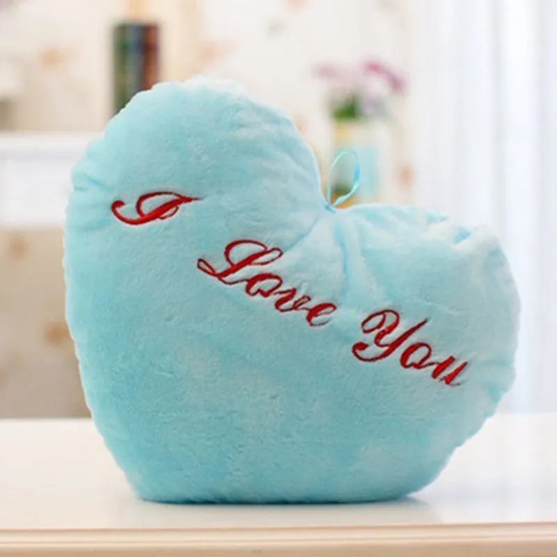 Colourful star-shaped plush cushion with LED flashing lights for children