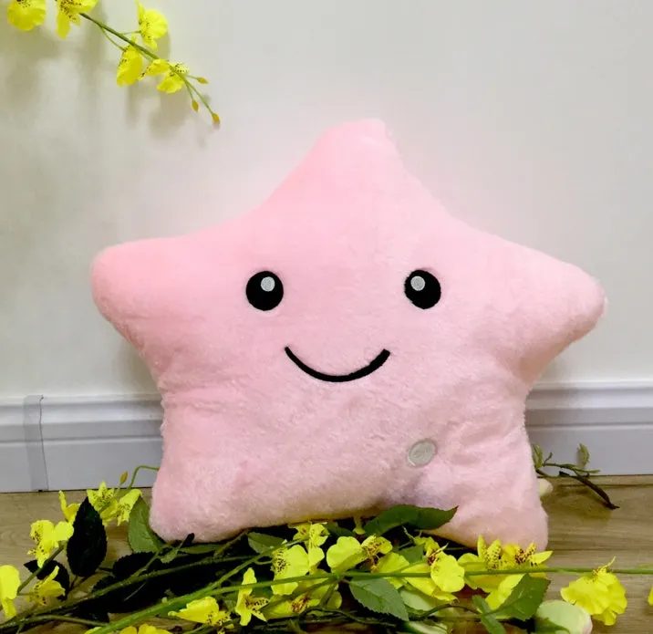 Colourful star-shaped plush cushion with LED flashing lights for children