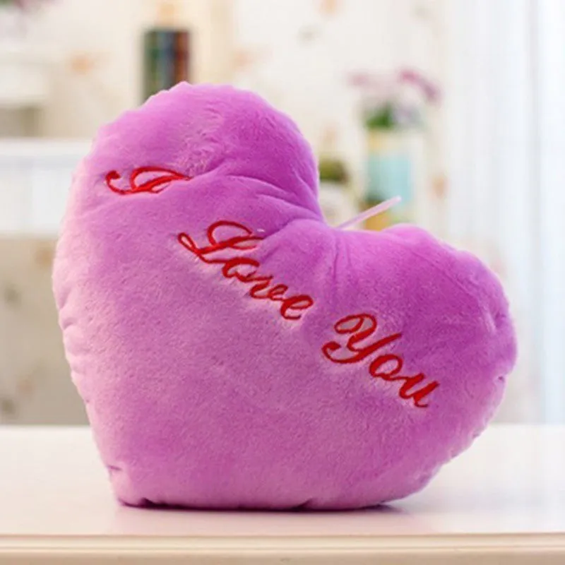 Colourful star-shaped plush cushion with LED flashing lights for children