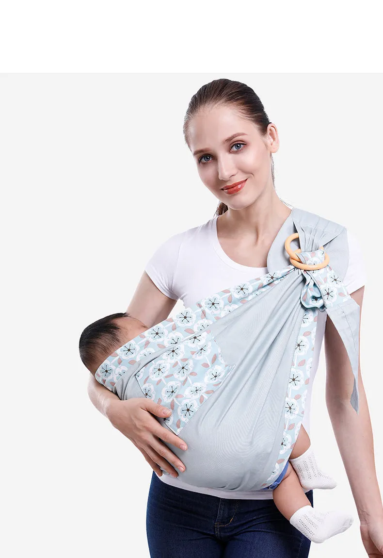 Adjustable baby wrap carrier sling shown in multiple colours, suitable for infants 0-36 months.