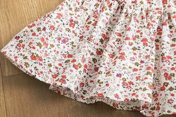 A girls' polyester playsuit outfit for summer in black, pink, or white, available in sizes 2T to 6T.