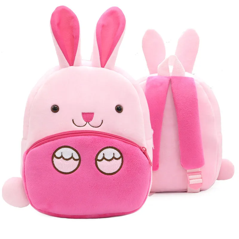 Small cloth animal backpack for children with cartoon design showing dimensions 26.5cm height by 24cm width