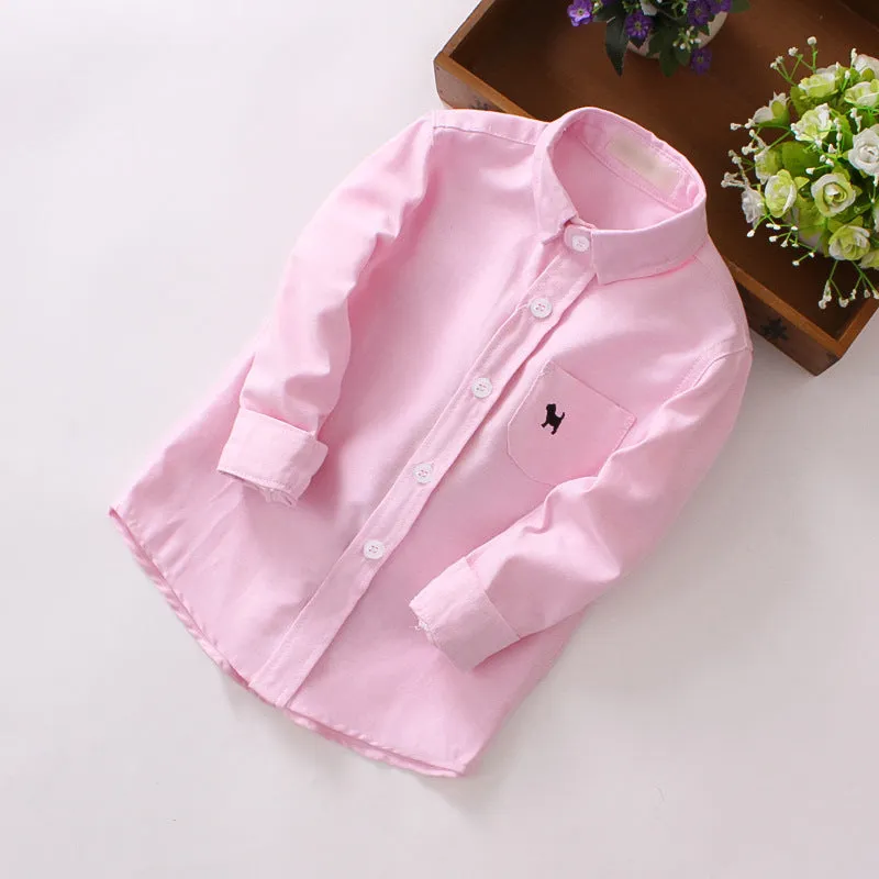 Boy's blue long sleeve cotton shirt with a lapel collar on a hanger.