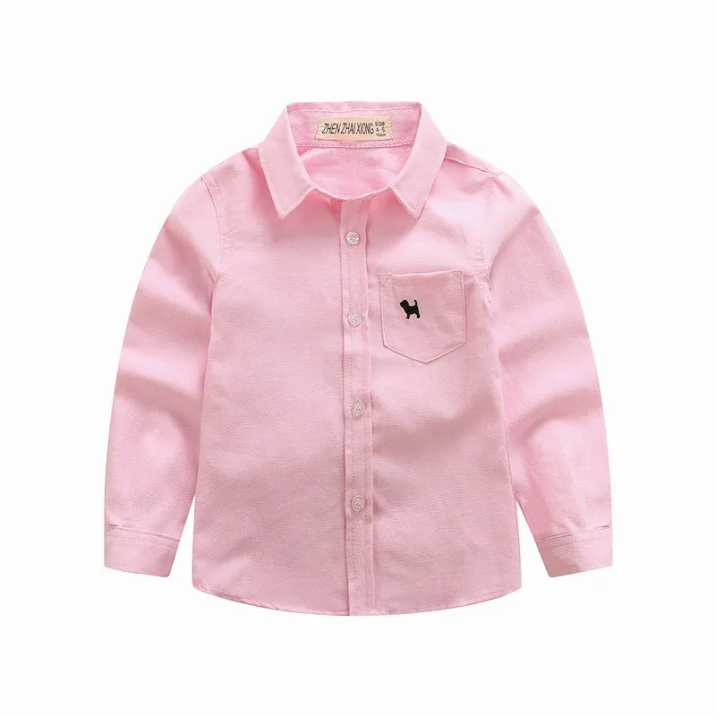 Boy's blue long sleeve cotton shirt with a lapel collar on a hanger.