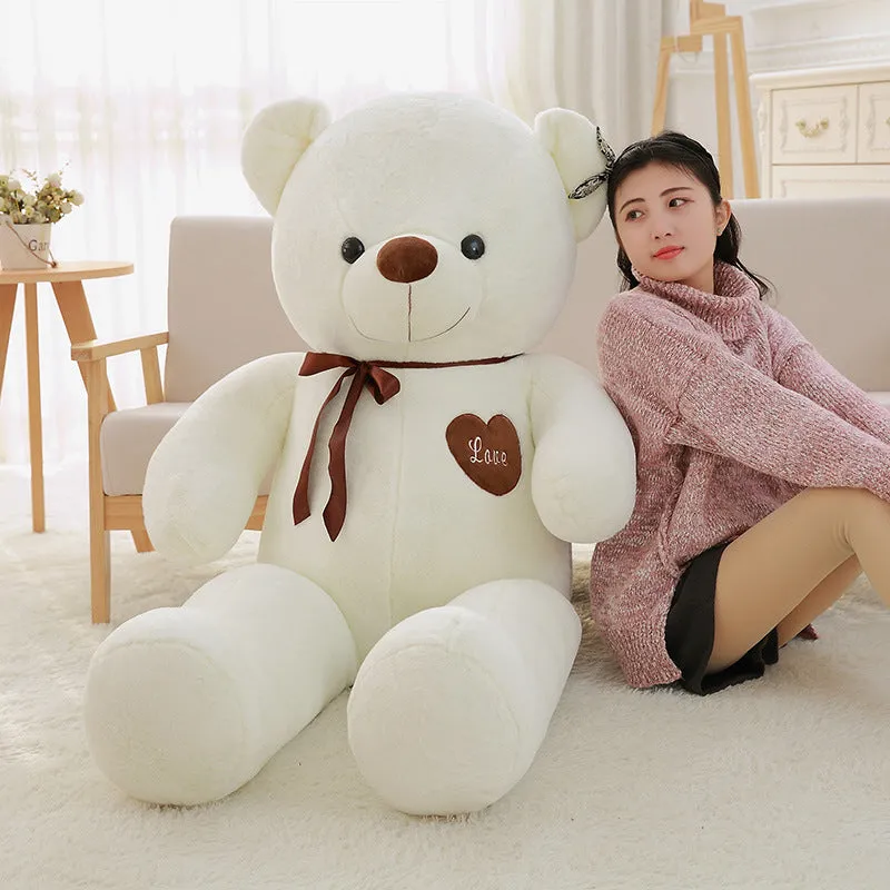 Plush teddy bear ragdoll in light brown with ribbon, 100cm height