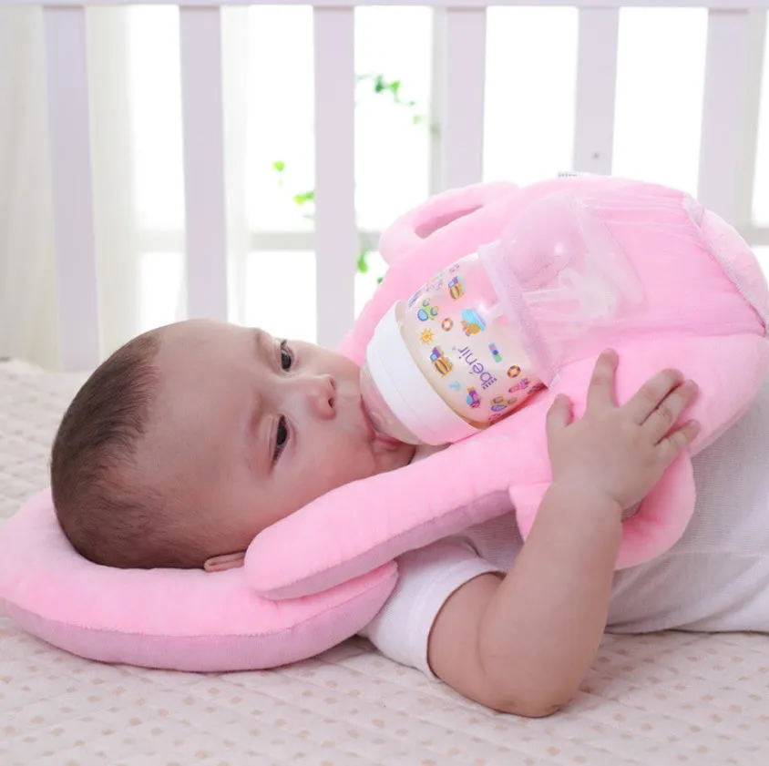 Super soft short plush baby feeding pillow measuring 30cm by 42cm in pink colour
