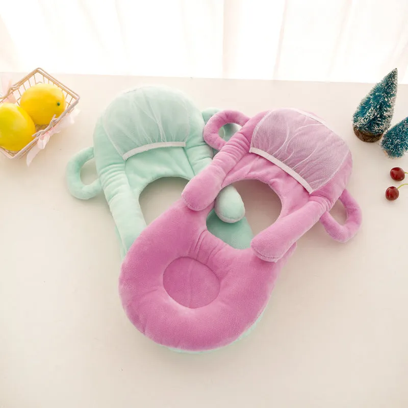 Super soft short plush baby feeding pillow measuring 30cm by 42cm in pink colour