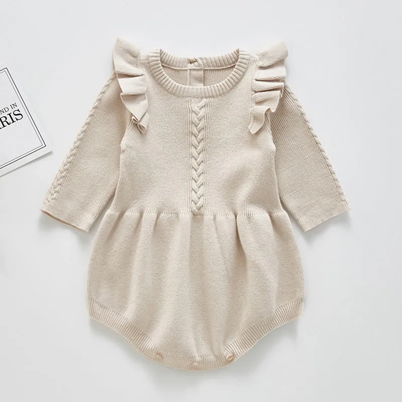 Baby girl's pink cotton princess romper with placket closure