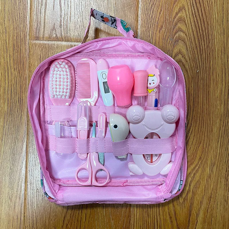 Roadfisher newborn baby care kit with grooming tools and health monitoring devices in blue or pink colour
