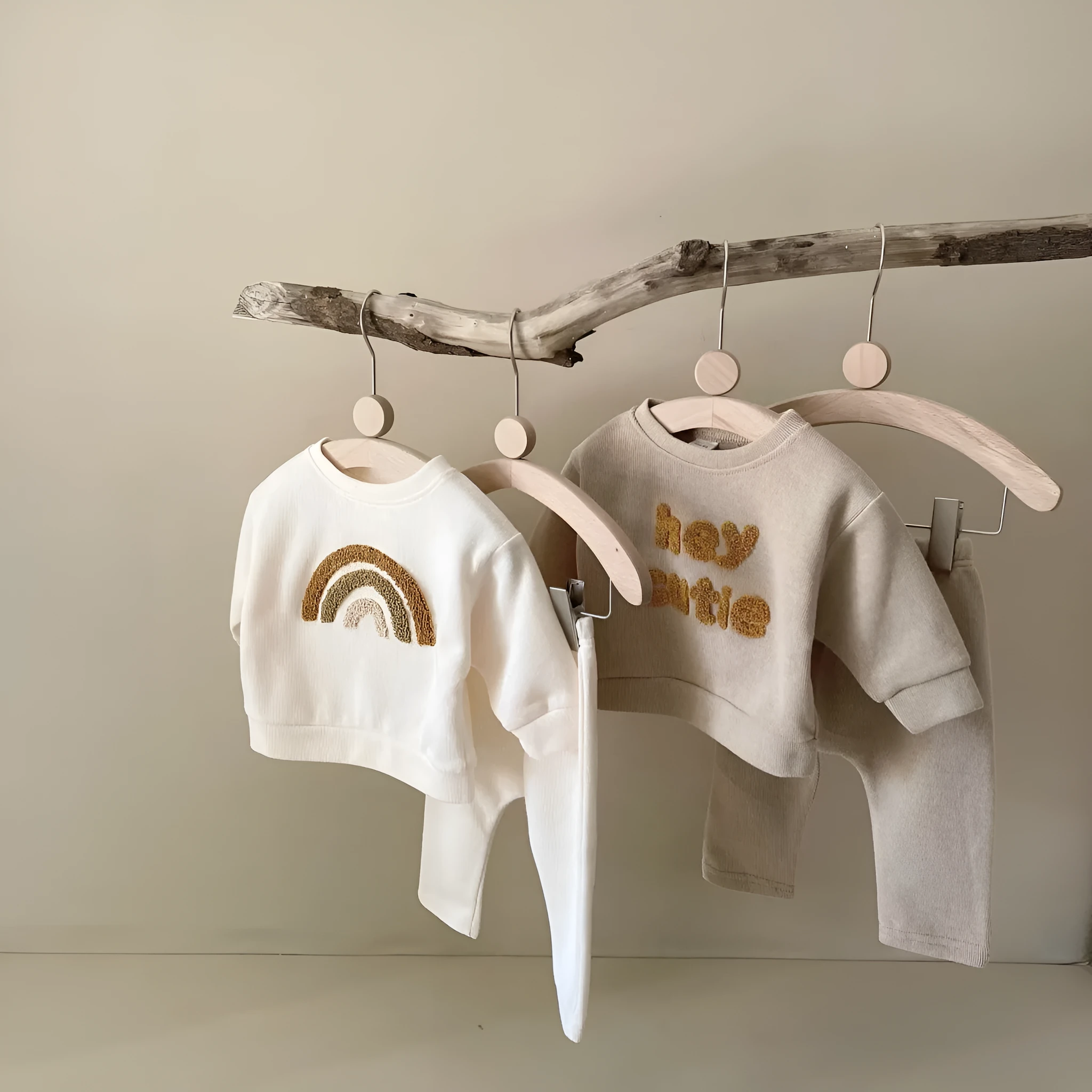 Creamy-white baby cotton two-piece suit with alphabet embroidery on long sleeve blouse and matching trousers