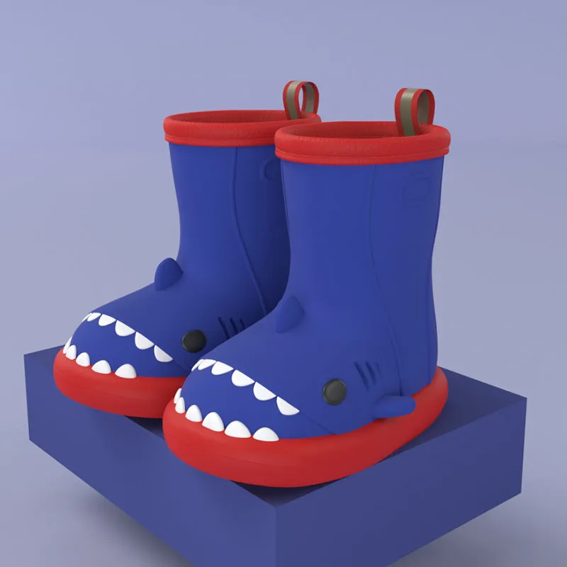 Shark and dinosaur design children's rain boots in green, available in multiple colours and sizes.