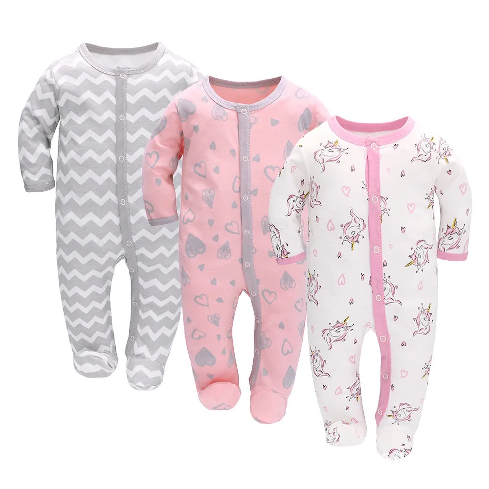 Set of three pure cotton baby jumpsuit rompers with long sleeves and concealed hook closures in animal print designs