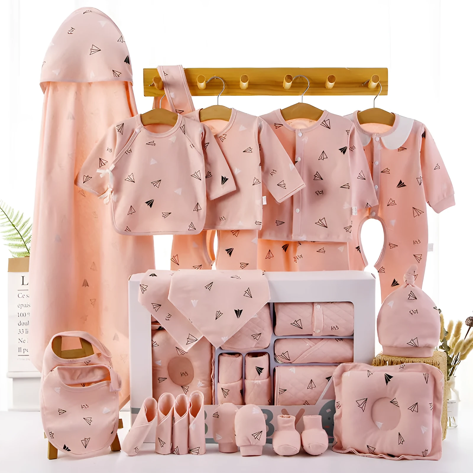 Baby cotton clothes gift box set showing cardigan suits with cartoon patterns in blue and pink