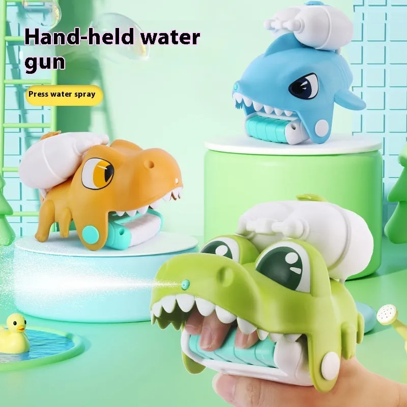 Children's handheld animal water gun toy in clownfish, shark, crocodile or dinosaur design.
