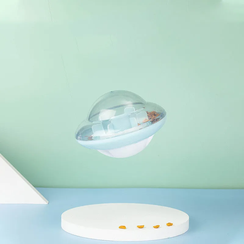 Blue pet tumbler ball toy with clear visual cabin and labyrinth column on floor