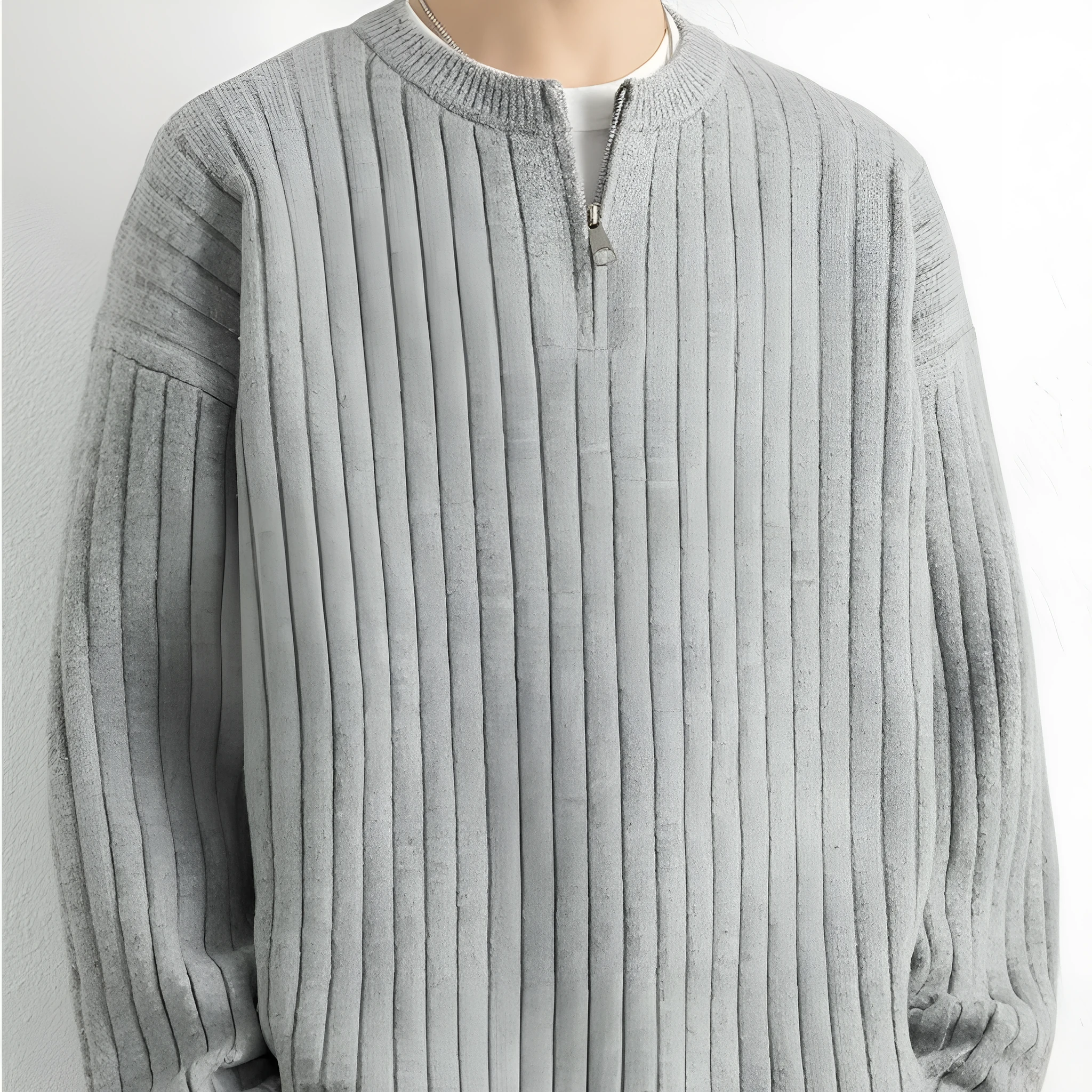 Men's grey half zip loose fit pullover sweater with textured knit on a hanger.