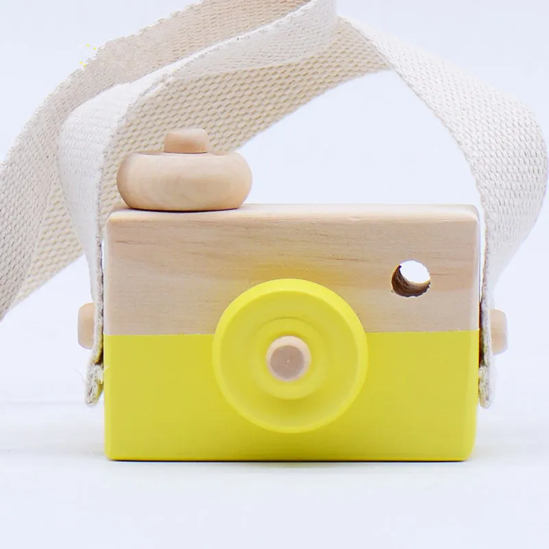 Wooden camera toy for kids in seven colours, unisex design, pivotable round part