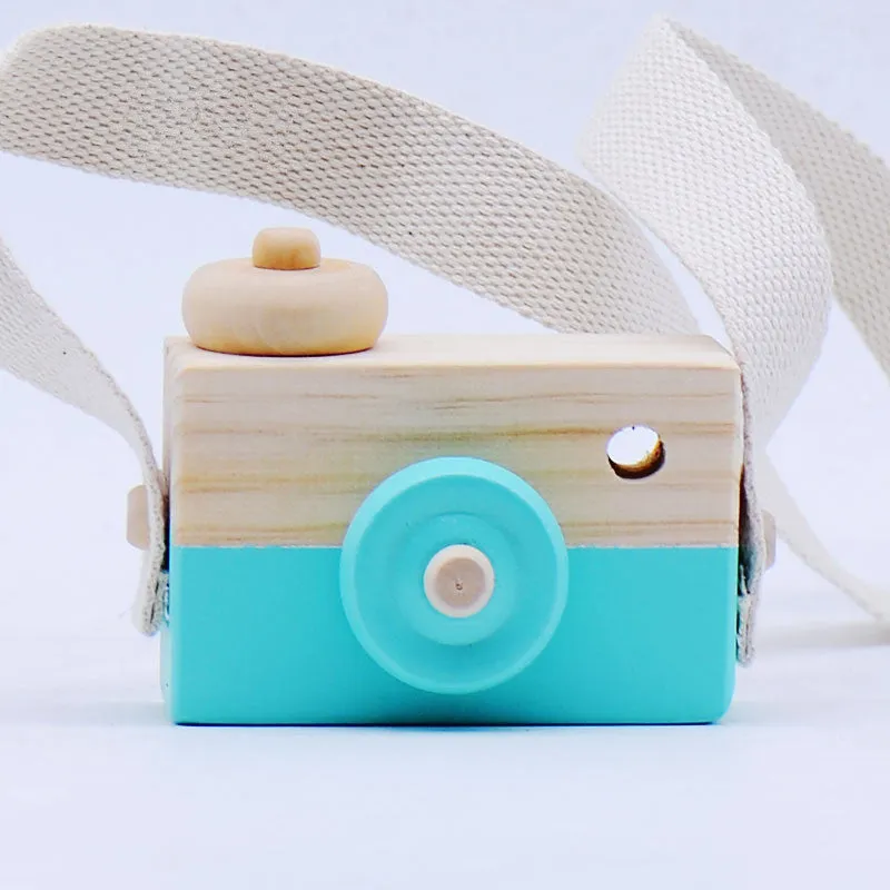 Wooden camera toy for kids in seven colours, unisex design, pivotable round part