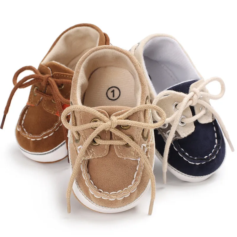 Baby soft bottom toddler shoes in beige with mesh upper and non-slip sole on a white background