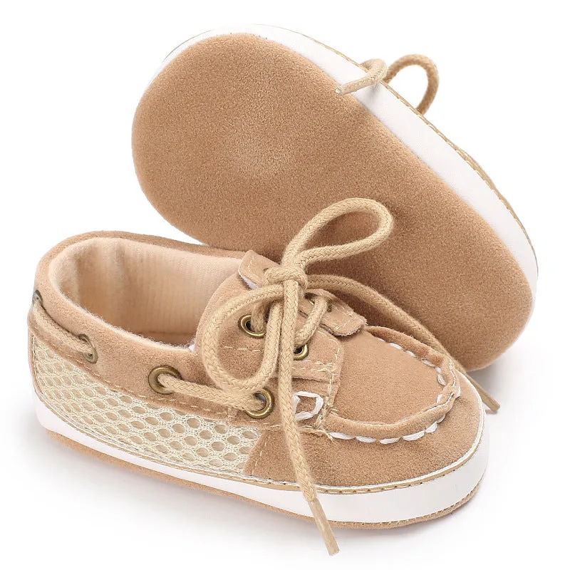 Baby soft bottom toddler shoes in beige with mesh upper and non-slip sole on a white background