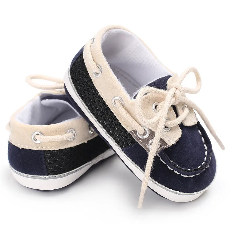Baby soft bottom toddler shoes in beige with mesh upper and non-slip sole on a white background