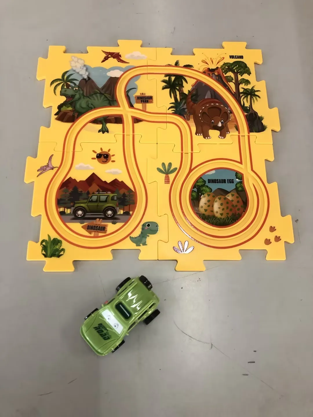 Children puzzle electric railroad speeder DIY assembly track set with automatic car and plastic pieces in multiple themes
