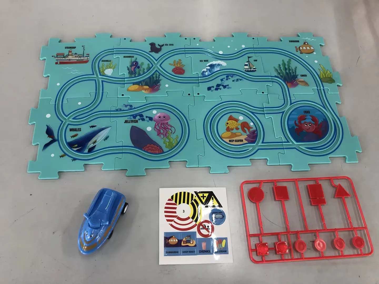 Children puzzle electric railroad speeder DIY assembly track set with automatic car and plastic pieces in multiple themes