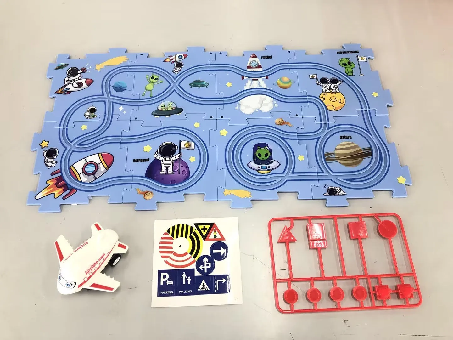 Children puzzle electric railroad speeder DIY assembly track set with automatic car and plastic pieces in multiple themes