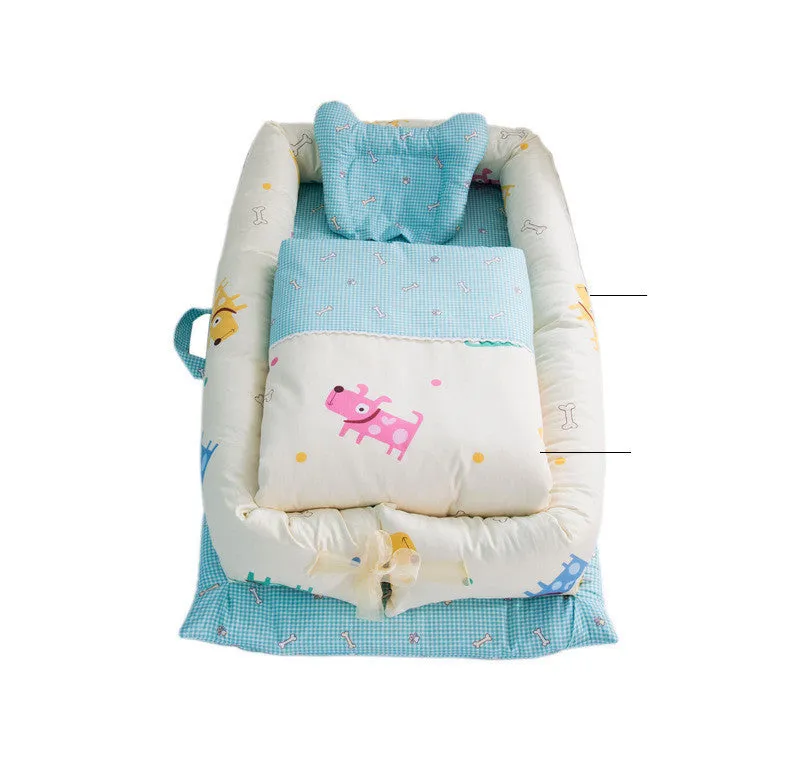Portable foldable newborn crib with bionic mattress, cotton cover, and quilt in feather white style