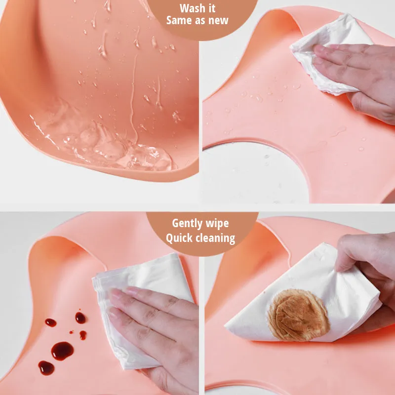 Soft waterproof silicone baby bib with food catcher in pink, with adjustable neck closure