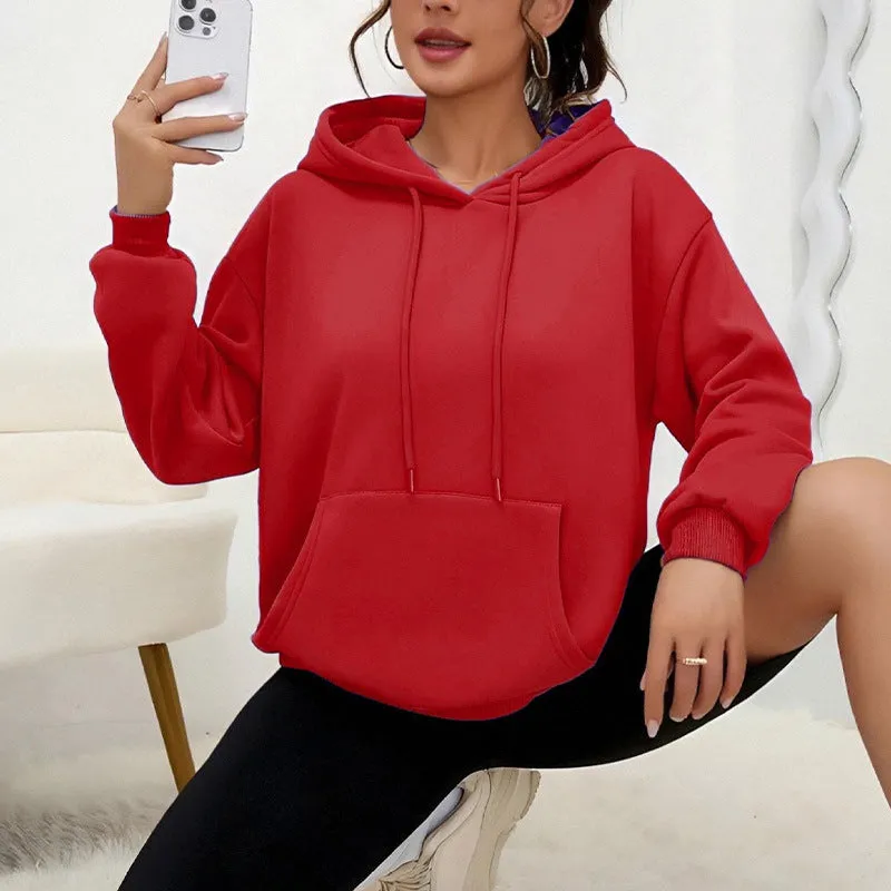 Women's loose grey drawstring hoodie with front pocket, laid flat.