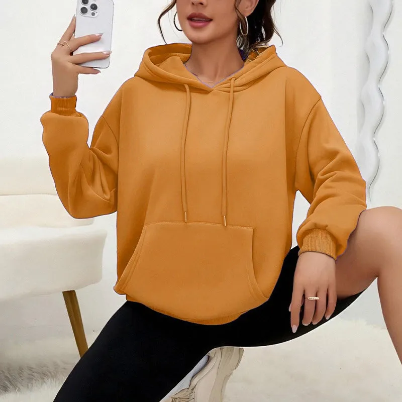 Women's loose grey drawstring hoodie with front pocket, laid flat.