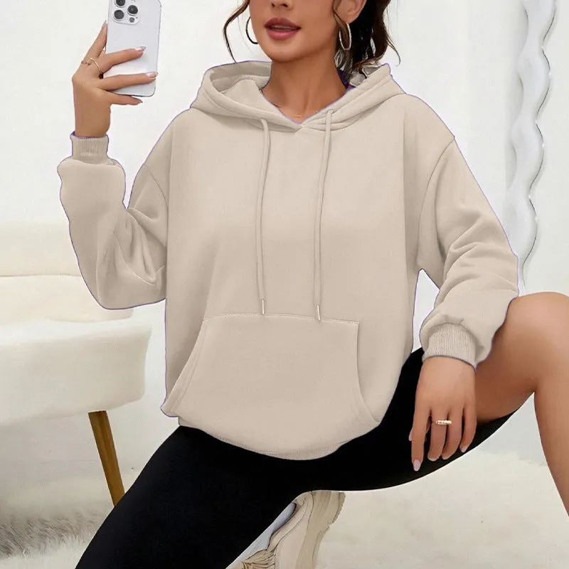 Women's loose grey drawstring hoodie with front pocket, laid flat.