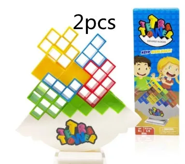 Balance stacking board game with 16 plastic coloured building blocks, base and chassis on a flat surface