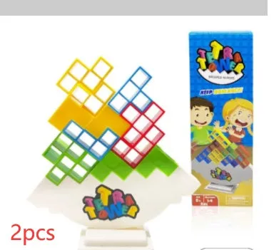 Balance stacking board game with 16 plastic coloured building blocks, base and chassis on a flat surface