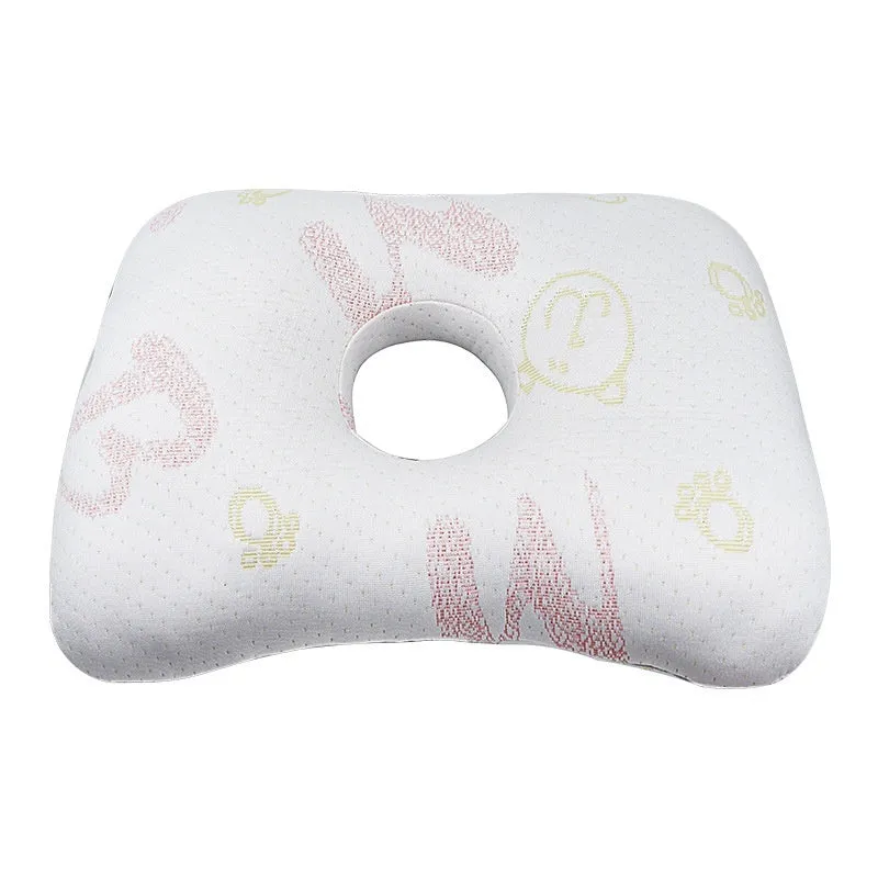 Beauty salon single hole ear pillow in Boer Grey colour on a treatment bed.