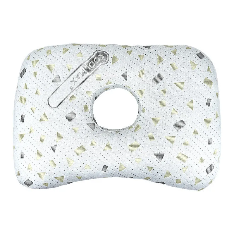 Beauty salon single hole ear pillow in Boer Grey colour on a treatment bed.