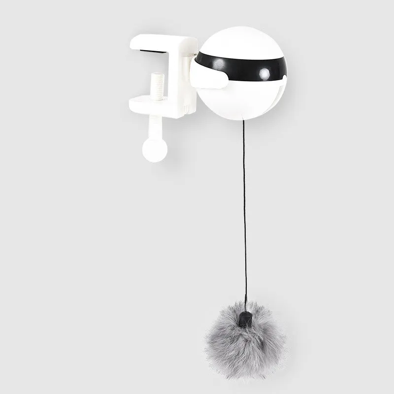 Electric automatic lifting cat toy with rabbit hair teaser and black ABS body on a light floor