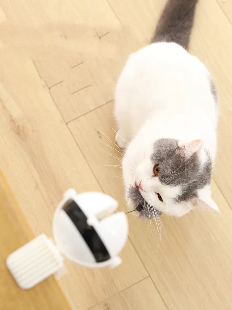 Electric automatic lifting cat toy with rabbit hair teaser and black ABS body on a light floor