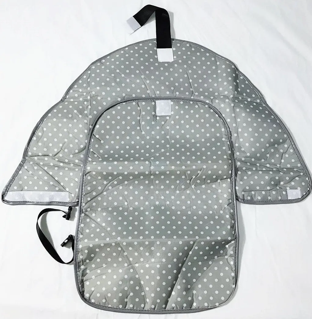Portable baby diaper changing mat in yellow geometric pattern, 70x50cm, with toy ring and wrist strap unfolded on floor