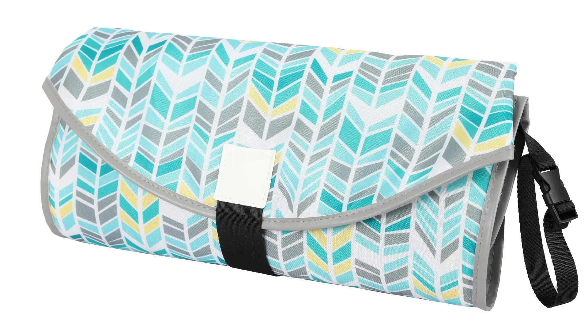 Portable baby diaper changing mat in yellow geometric pattern, 70x50cm, with toy ring and wrist strap unfolded on floor