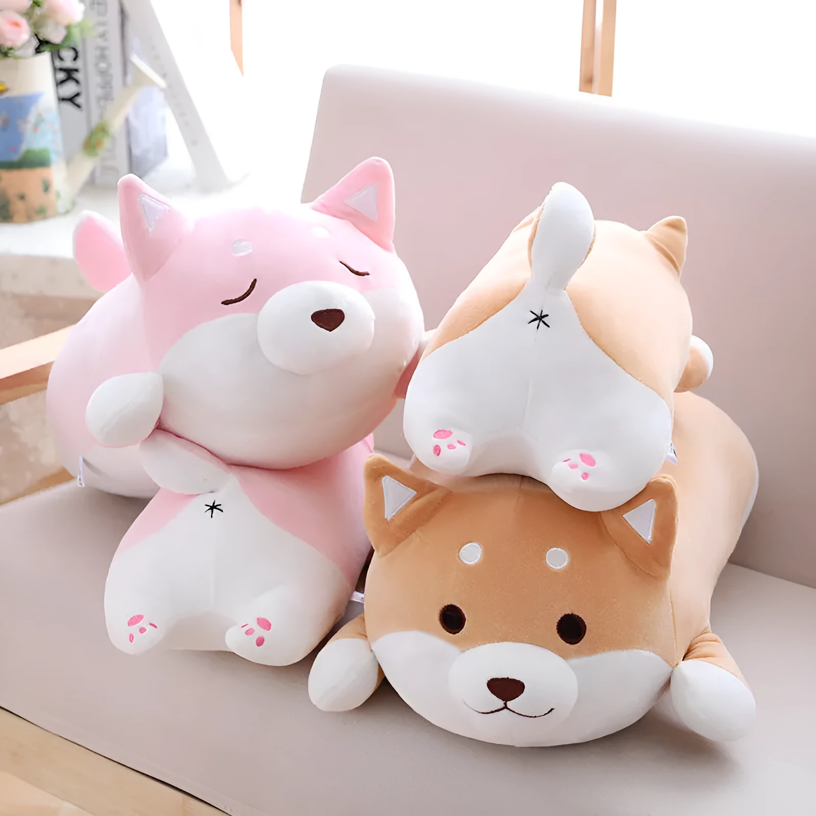 Cute fat Shiba Inu dog plush toy in brown on a white background, soft stuffed animal with cartoon face