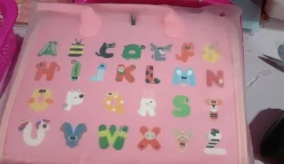 Soft felt busy board for toddlers with dressing and buttoning activities, foldable design, colourful style