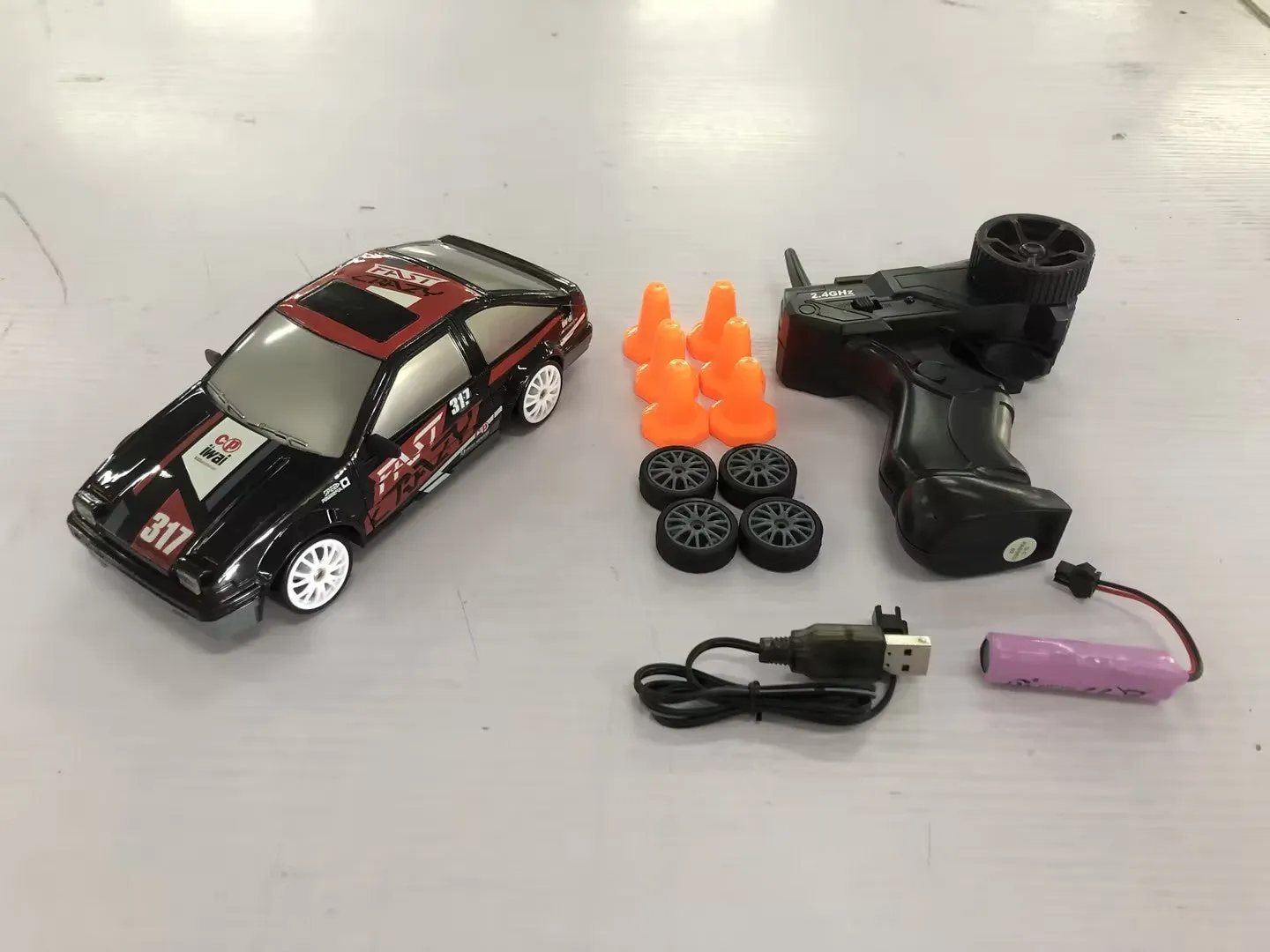 2.4G RC drift car 4WD 1:24 scale remote control toy GTR model in classic style on road with traffic cones